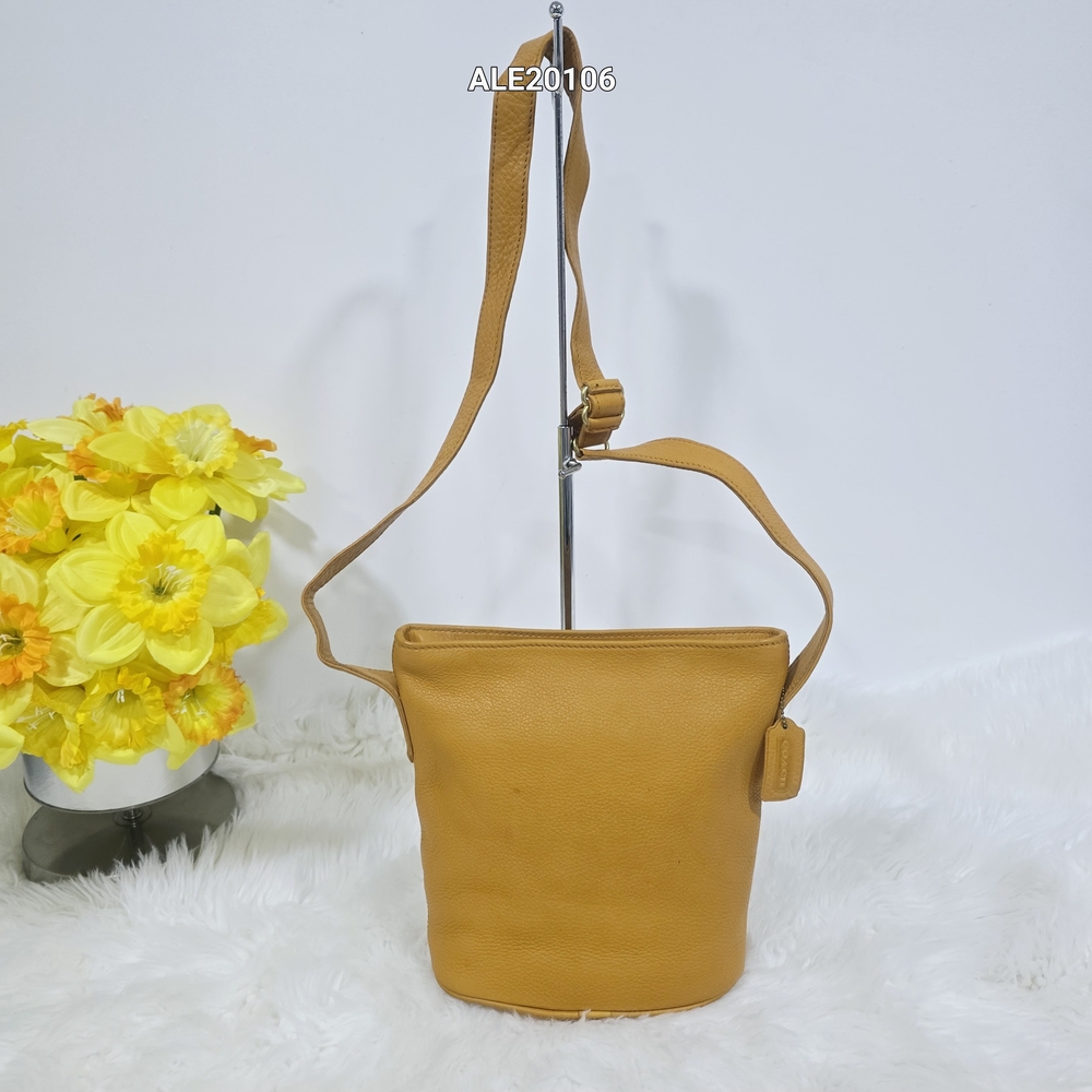 Coach Equestrian leather mustard yellow Slim Bucket Crossbody Bag Style No. 4907